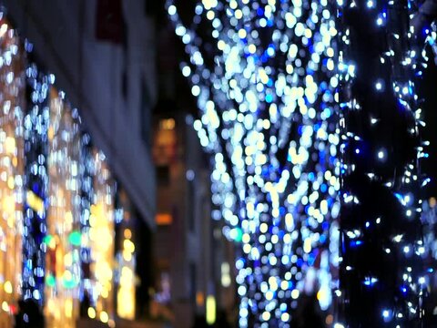 Christmas illumination lights in blue fantasy lights Roppongi hill Tokyo Japan season decotation blur background