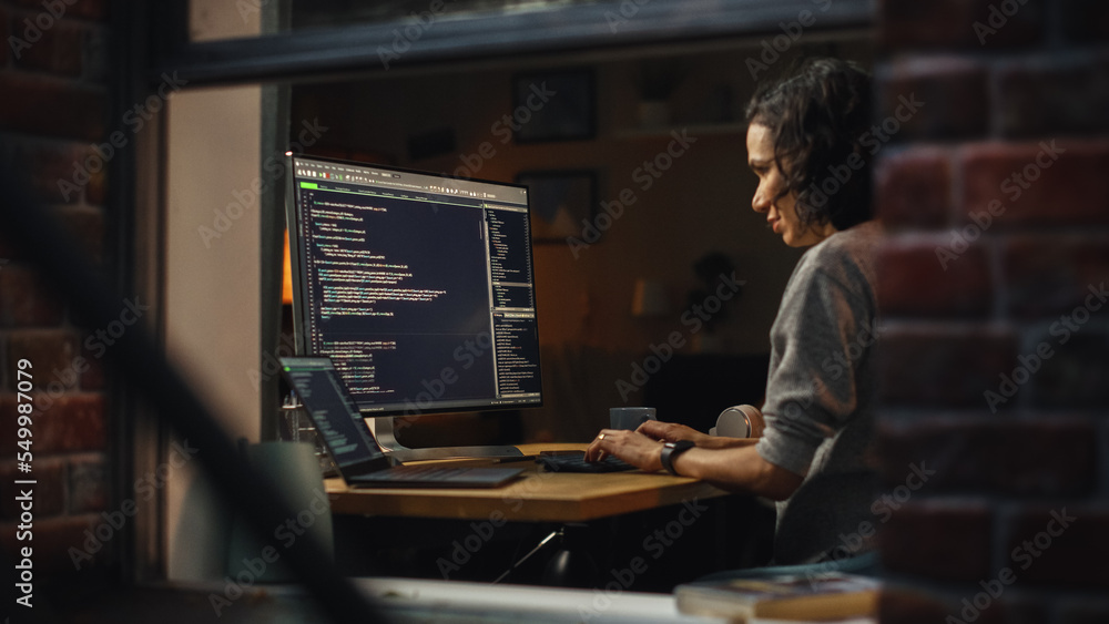 Leinwandbilder night home office: young hispanic woman is working on desktop computer. software developer, e-commer