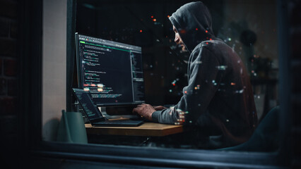 Hacker Using Desktop Computer to Perpetuate Cyber Attack, Doing DDOS Attack, Sends Viruses,...