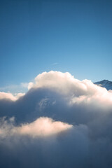 Fototapeta na wymiar High quality landscape photo of Austrian mountain range with blue sky. Image of mountain peak covered in snow.