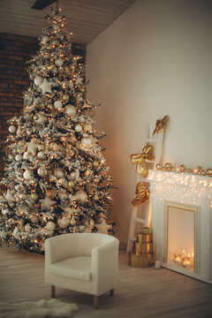 Christmas decor. Holiday at home. Christmas room with a beautiful Christmas tree. High quality photo