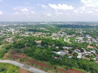 aerial view of residential area filled with greenery.