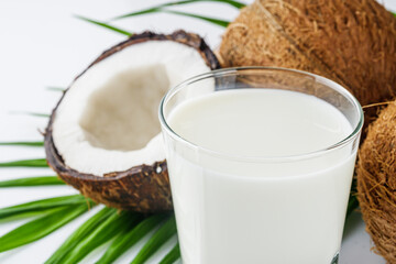 fresh natural coconut milk on a white acrylic background
