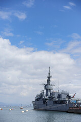 Warship sailing in still water