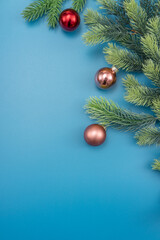 Christmas composition. festive decor on blue background. Copy space, flat lay, top view.