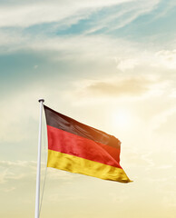 Waving Flag of Germany with beautiful Sky. 