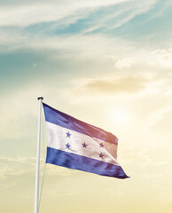 Waving Flag of Honduras with beautiful Sky. 