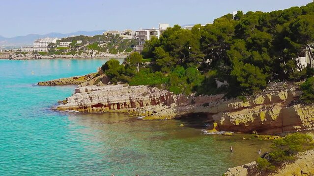 Beautiful landscape of rock formations on the La Pineda beach in Salou Spain.