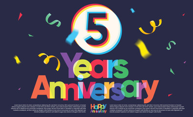 colorful five years anniversary greeting message on dark background, exploding confetti