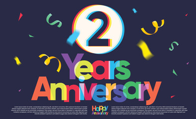 colorful two years anniversary greeting message on dark background, exploding confetti