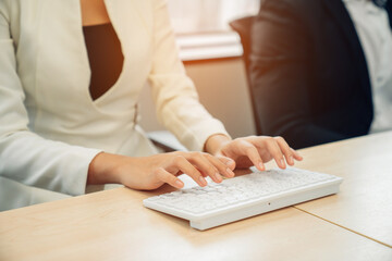 closeup hands of businesswoman working at office, Man typing keyboard on laptop or computer