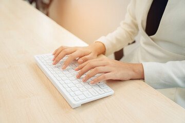 closeup hands of businesswoman working at office, Man typing keyboard on laptop or computer