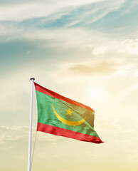 Waving Flag of Mauritania with beautiful Sky.