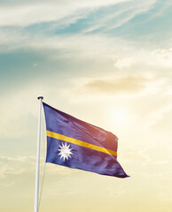 Waving Flag of Nauru with beautiful Sky.