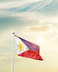 Waving Flag of Philippines with beautiful Sky.