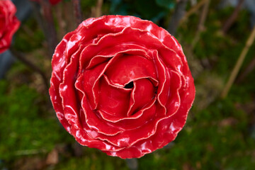 Beautiful garden decoration, a flower replica made of ceramic, (red rose replica).