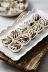 Beautiful and delicious homemade cookies or sweets with white and dark chocolate in retro grunge style.