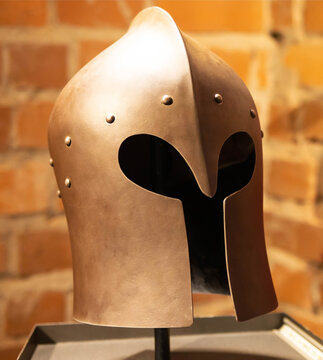 Protective old Barbute helmet from the 14th century used in Europe, close-up