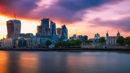 Panorama of London cityscape financial district at sunset with dramatic sky - obrazy, fototapety, plakaty