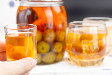 Glass of Japanese plum wine 'Umeshu',Japanese plum wine.Pickled plum wine.