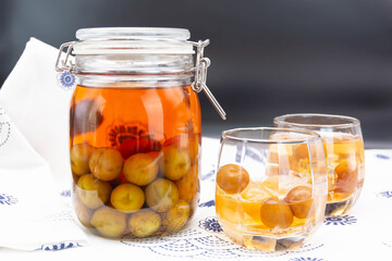 Glass of Japanese plum wine 'Umeshu',Japanese plum wine.Pickled plum wine.