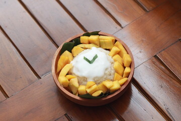 a close up of mango sticky rice