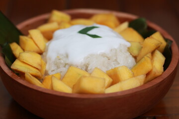 a close up of mango sticky rice