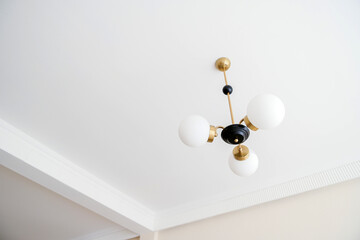 Modern chandelier decoration in white living room