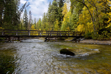 Bridge to walk over and across Kintla Creek at Glacier National Park in Montana