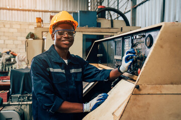 Industrial workers cooperating while doing quality control of manufactured products in a factory.