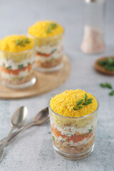 Mimosa salad in transparent glass
