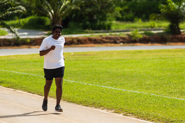 Asian young lifestyle athlete sport runner black man wear feet shoe active running training at the outdoor on the treadmill line road, healthy exercise workout