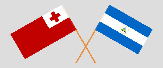Crossed flags of Tonga and Nicaragua. Official colors. Correct proportion