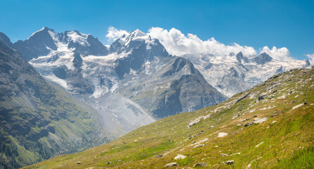 Fototapeta na wymiar The Piz Bernina and Piz Roseg peaks - Switzerland.