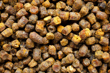 Top view of bee pollen. Bee perga, background, texture. Perga top view. Sperfood bee perga, background, texture, top view.