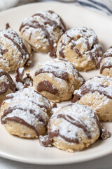 Chocolate cookie. Bakery products. Cookies on a white wood background. close up