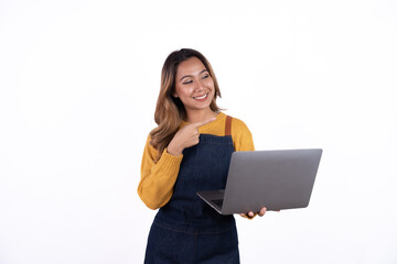 Asian woman entrepreneur or shop owner holding a  laptop computer with an excited face. isolate on a white background.