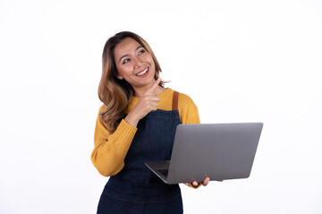 Asian woman entrepreneur or shop owner holding a  laptop computer with an excited face. isolate on a white background.