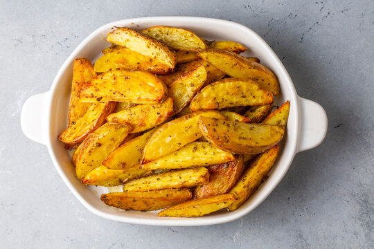Baked spiced potatoes look delicious.
