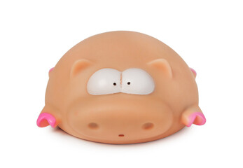 Rubber toy pig isolated on white