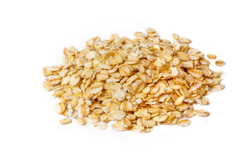Heap of dry rolled oats isolated
