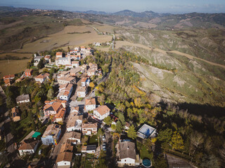 Italy, November 26, 2022: aerial view of the village of Montecalvo in Foglia in the province of Pesaro and Urbino in the Marche region