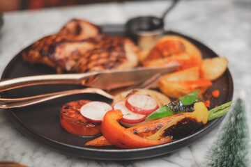 A variety of vegetable grilled or burn as a side dish of Chicken steak for bar-b-q for lunch or dinner. Concept of healty side dish.