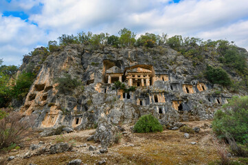 Fototapeta na wymiar Rock tombs of Pinara ancient city in Lycia, Antalya, Turkey