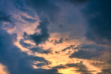 Naklejka na ściany i meble Beautiful dramatic sunset sky with clouds