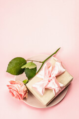 Romantic dinner table isolated on rose background. Love concept for Valentine's or Mother's day