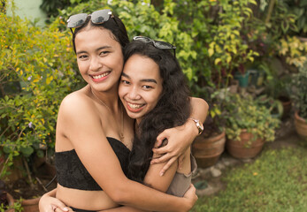 Fototapeta premium Feel good scene of two best friends hugging each other. Appreciating and cherishing their long years of friendship.