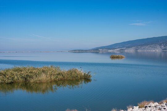 calm lake with blue sky. Lake Karla, Greece