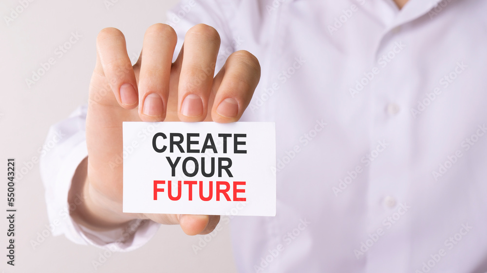 Aufkleber man holding a card with text create your future