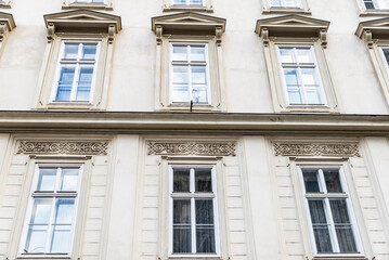 Fototapeta na wymiar Facade of an old classic building in Vienna, Austria